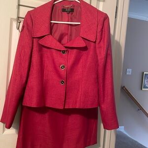 Alex Marie 2 piece suit, skirt (8P) with jacket (6P) in a rich dark pink.